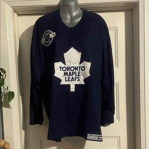 CCM Dark Blue Toronto Maple Leafs Jersey. Comes with free hat.